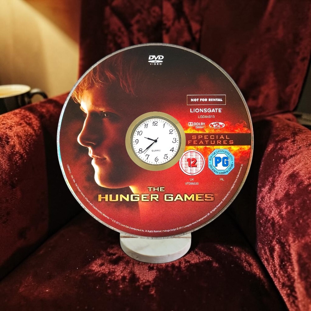 The Hunger Games Novelty Desktop DVD Clock With Fixed Gold Insert - Design 1