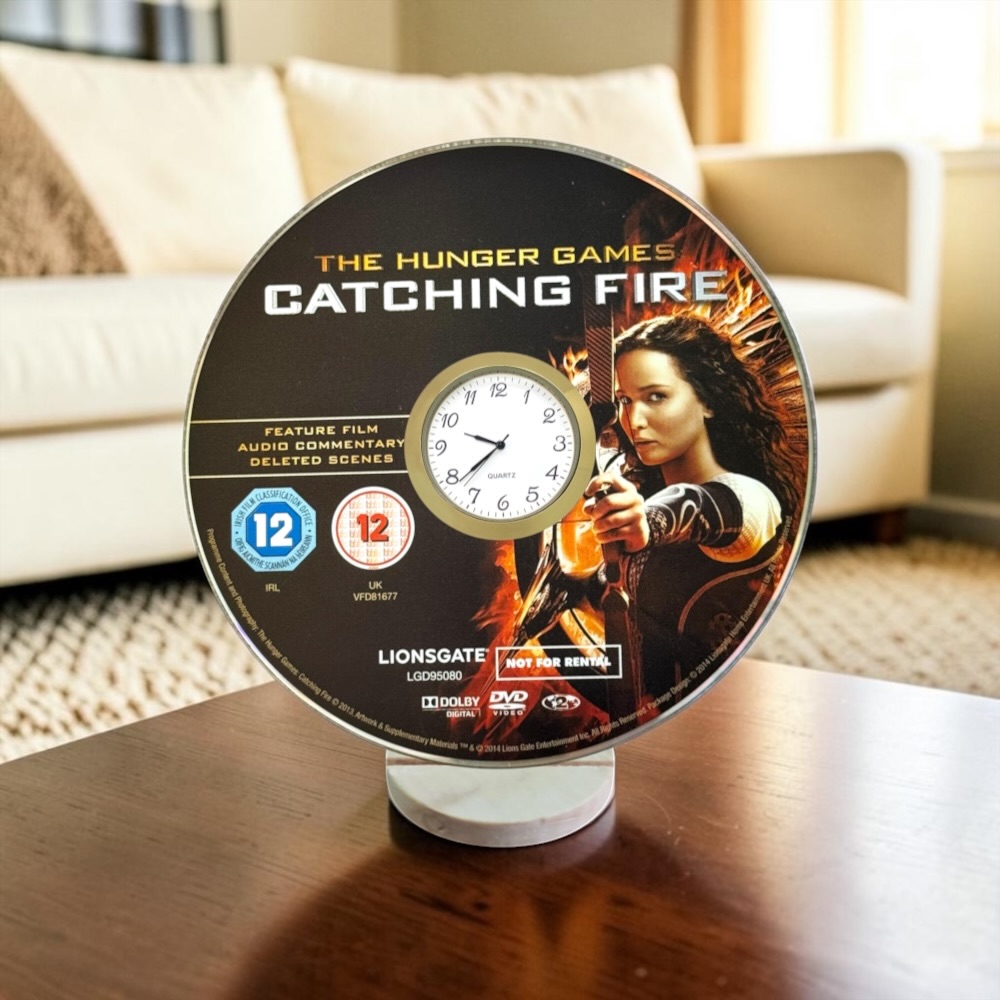 The Hunger Games Catching Fire Novelty Desktop DVD Clock With Fixed Gold Insert